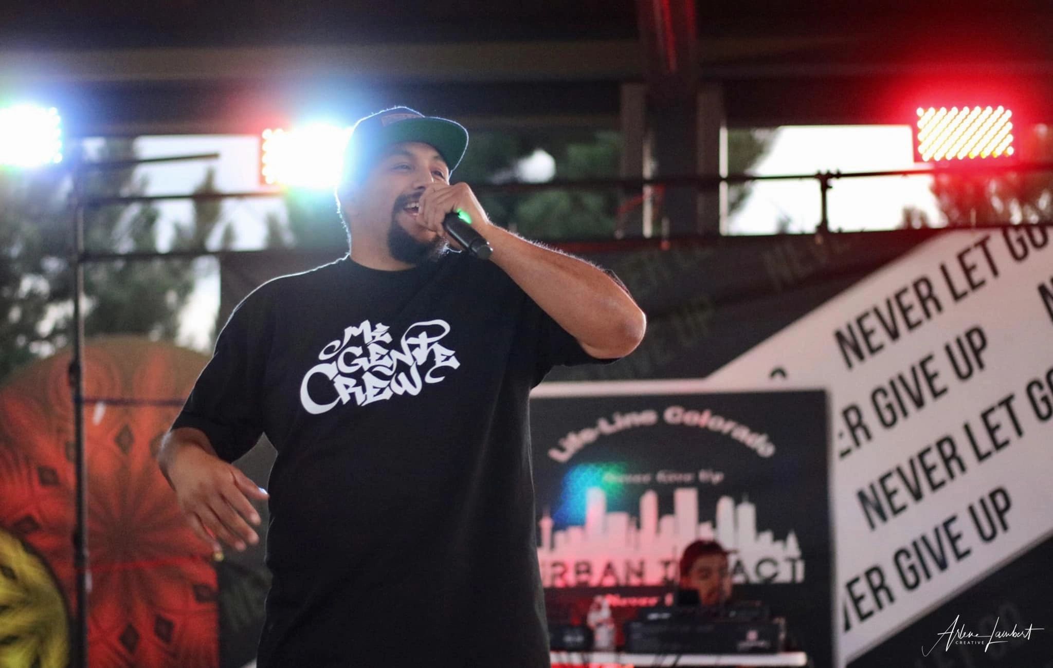 Mi Gente Crew performing on outdoor stage